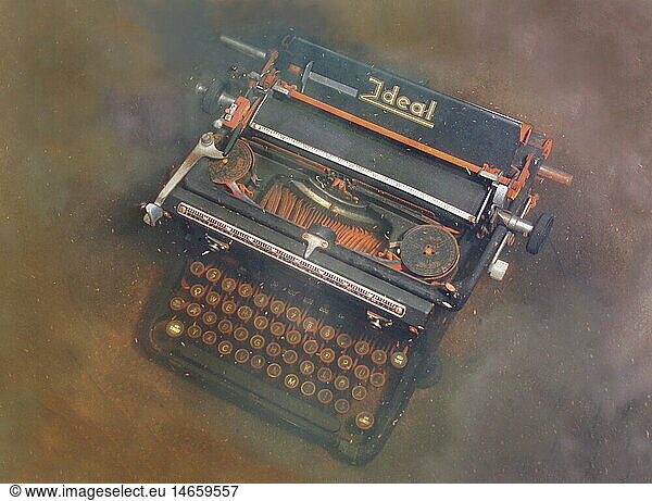 technics  typewriters  old rusty typewriter (typ Ideal  Seidel and Naumann Company  Germany  circa 1928) in water