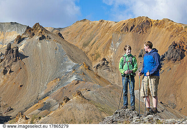 teenage brothers hiking in Landmannalaugar - a geothermal area