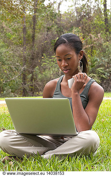 Teenage Girl Communicating through Laptop
