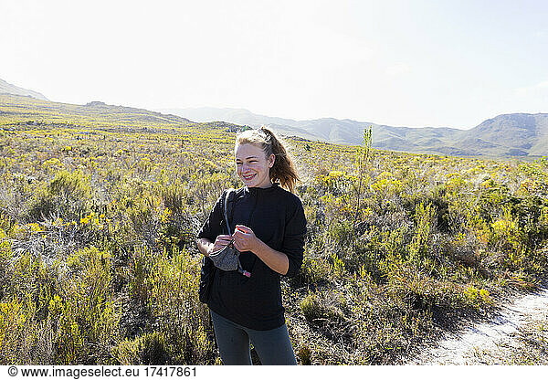 Teenage girl on Waterfall nature trail, Stanford, South Africa.