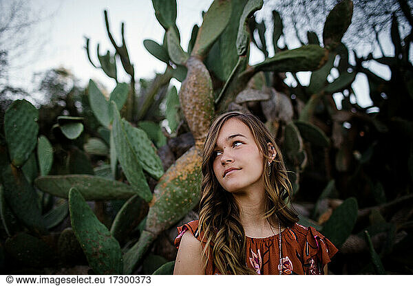 Teenage Girl Posing in Front of Cactus in San Diego