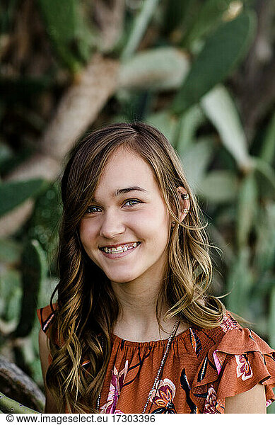 Teenage Girl Posing in Front of Cactus in San Diego