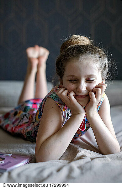 teenage girl smiling closing eyes