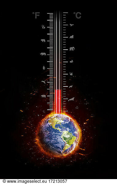 Temperature rising on global warming thermometer
