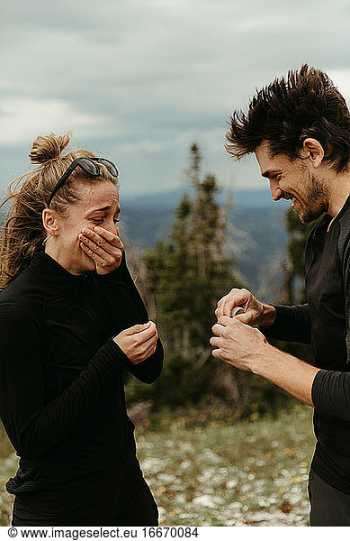 that moment when he proposes on a mountain top and she's overwhelmed