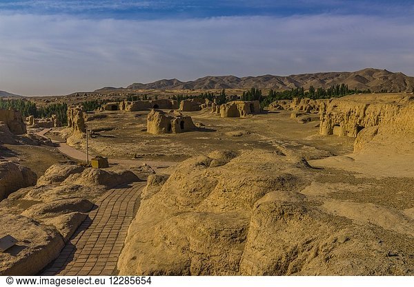 The Ancient City of Jiaohe sits on an island made of mud (adobe)  as were its buildings and is surrounded by two rivers. It was built in 60 BC and was a station on the Silk Road. It is the largest and best preserved ancient city built from compressed earth anywhere in the world. Yarnaz Valley  Turpan  Xinjiang Province  China.