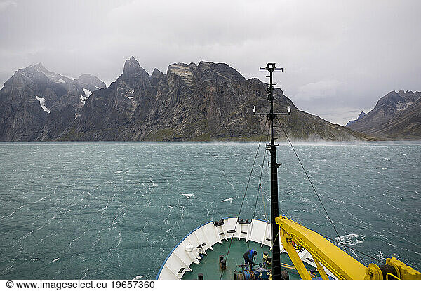 The Arctic expedition ship  Akademik Shokakskiy  sails through the Prins Christian Sound in Greenland.