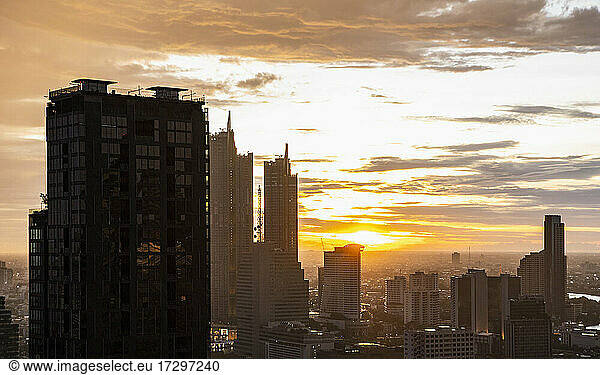 the Bangkok skyline at sunset seen from Sathorn district