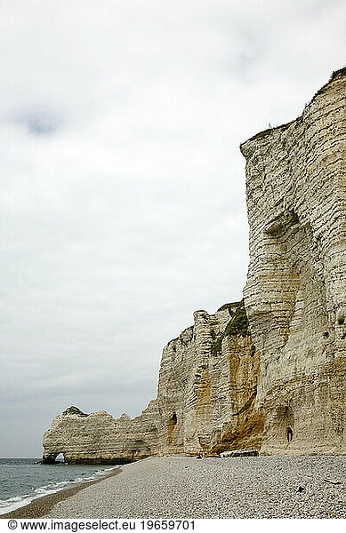 The beach at Etretat with its cliffs also known as Falaises  Normandy  France.