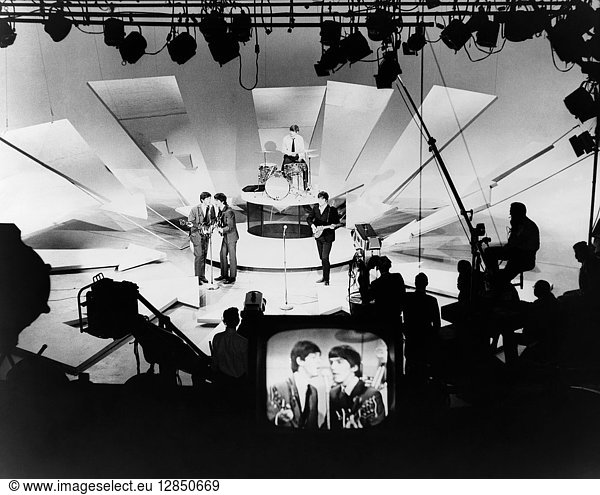 THE BEATLES  1964. The Beatles; Paul McCartney  George Harrison  Ringo Starr  and John Lennon; rehearsing for an appearance on 'The Ed Sullivan Show.' Photograph  1964.