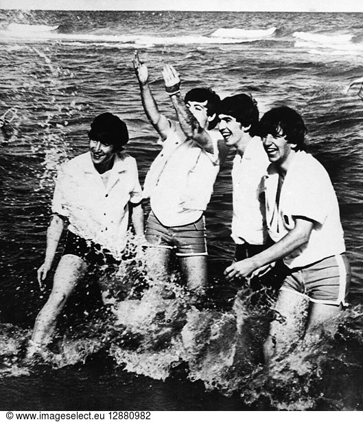 THE BEATLES  1964. The Beatles playing in Lake Erie during a trip to Cleveland  Ohio to play a concert  1964. Left to right: John Lennon  Paul McCartney  George Harrison and Ringo Starr.