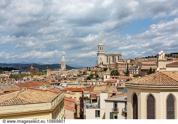 The cathedral and Sant Felix church behind skyline from the old walls of Girona Town