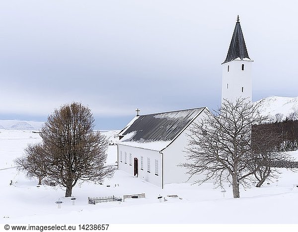 The church of Holar during winter. Holar is a famous archaeological site and is home to the Holar University Collage focusing on agriculture  horse breeding and tourism. europe  northern europe  iceland  March
