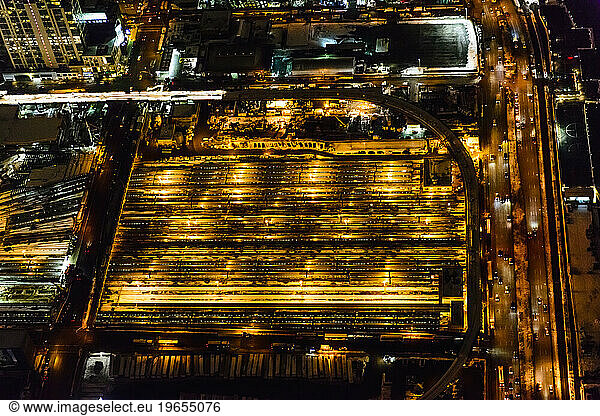 The city of New York City  Manhattan  aerial view at night.