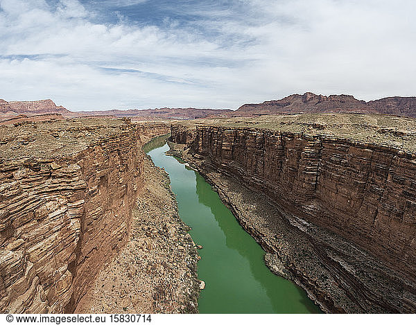 The Colorado River Cuts a Green Line through the Desert in Marbl