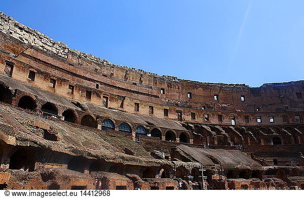 The Colosseum  or the Coliseum  originally the Flavian Amphitheatre in Rome  Italy. construction started in 72 AD under the emperor Vespasian and was completed in 80 AD under Titus. Capable of seating 50 000 spectators  the Colosseum was used for gladiatorial contests and public spectacles such as mock sea battles  animal hunts  executions  re-enactments of famous battles