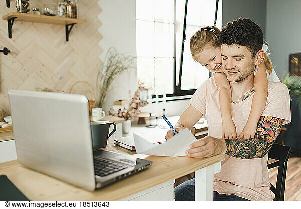 the family communicates at home in the kitchen