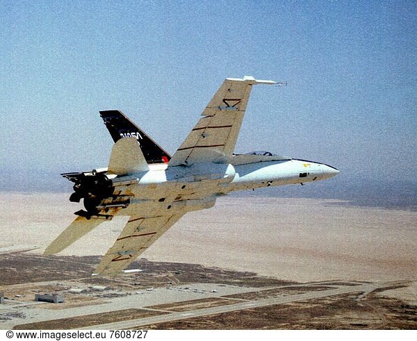 The final flight for the F_18 High Alpha Research Vehicle HARV took place at NASA Dryden Flight Research Center  Edwards  California  on May 29  1996 and was flown by NASA pilot Ed Schneider. The highly modified F_18 airplane flew 383 flights over a nine year period and demonstrated concepts that greatly increase fighter maneuverability. Among concepts proven in the aircraft is the use of paddles to direct jet engine exhaust in cases of extreme altitudes where conventional control surfaces lose effectiveness. Another concept  developed by NASA Langley Research Center  is a deployable wing_like surface installed on the nose of the aircraft for increased right and left yaw control on nose_high flight angles.