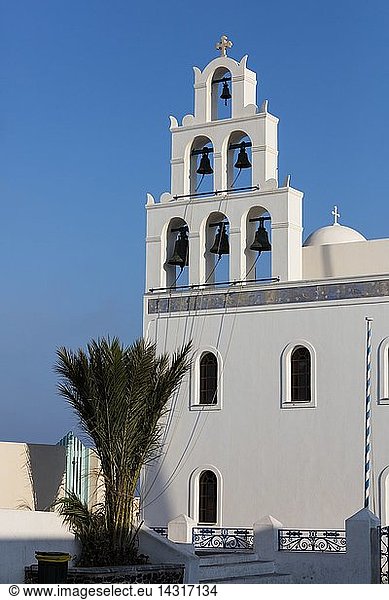The Holy Orthodox Church of Panagia with the colors white and blue the icons of Greece Oia  Santorini  Cyclades  Greece  Europe