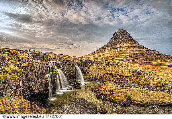 The Kirkjufell waterfall at sunrise  Snaefellsnes Peninsula  Western Iceland  Polar Regions