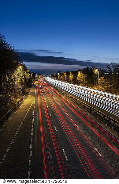 The M56 Motorway at night with traffic trails looking westbound  Cheshire  England  United Kingdom  Europe