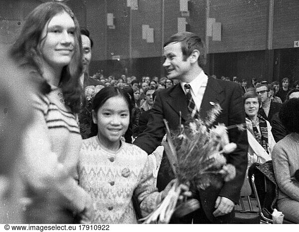 The massacre by the US military in My Lai  Vietnam in 1968 caused a worldwide outrage  including in Germany. One of the few survivors was Vo Thi Lien (12 years old)  who travelled to Germany. Here at a rally of the peace movement in 1968 in Düsseldorf. Vo Thi Lien (12 y. survivor of the massacre) 2nd from right Frank Werkmeister 1  Germany  Europe
