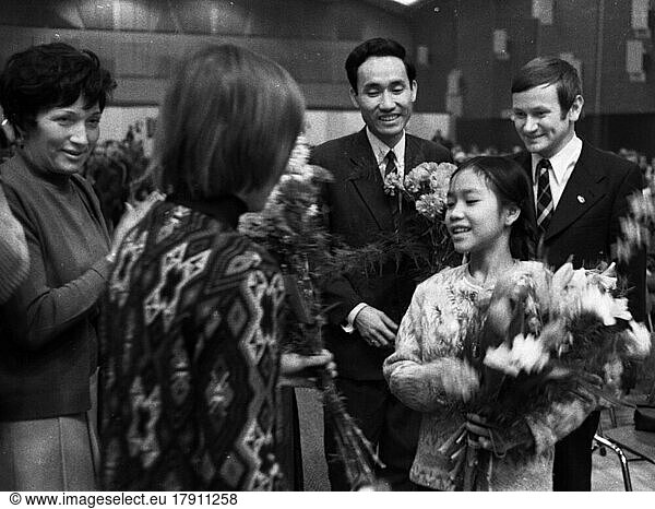 The massacre by the US military in My Lai  Vietnam  in 1968 caused a worldwide outrage  including in Germany. One of the few survivors was Vo Thi Lien (12 years old)  who travelled to Germany. Here at a peace movement rally in Düsseldorf in 1968. Elly Steinmann 1. f. l. Vo Thi Lien (survivor My Lai 12 y.) 2. r. Frank Werkmeister 1  Germany  Asia