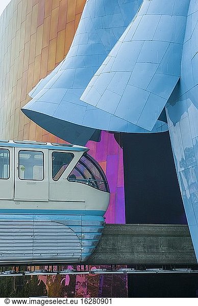 The monorail stopping at the station at the Museum of Pop Culture (designed by Frank O. Gehry) at the Seattle Center in Seattle  Washington State  USA.