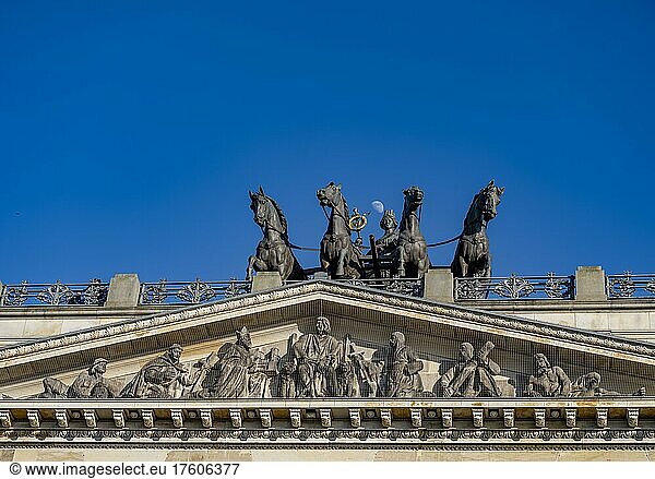 The moon shines above the quadriga with the city goddess Brunonia on the reconstruction of Braunschweig Castle  today Schloss-arcades. The quadriga is the largest in Europe. Braunschweig  Lower Saxony  Germany  Europe