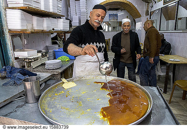 The most famous knaffieh (Palestinian cheese pastry) shop in Nablus  West Bank  Palestine.