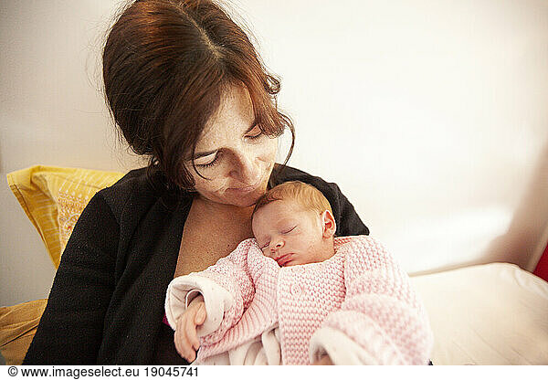 The new born Marie-Lou and her happy mom Ã?lÃ©onore.