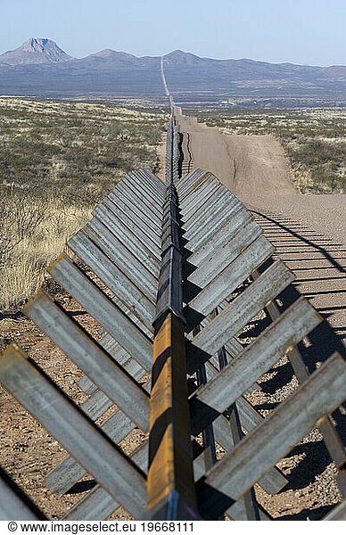 The new Normandy-style border fence runs through parts of eastern Arizona.