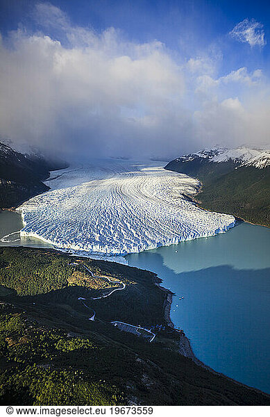 The Perito Moreno Glacier  aerial view of the glacier terminus and the waters of the ocean.