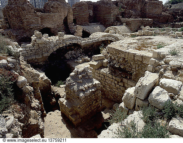 The Roman baths at Alexandria,  Built on three levels: the highest was the cold bath,  the middle the warm bath,  the base the steam bath. View of excavations revealing the underground columns of the hypocaust. Egypt. Graeco-Roman. Roman Period. Alexandria.