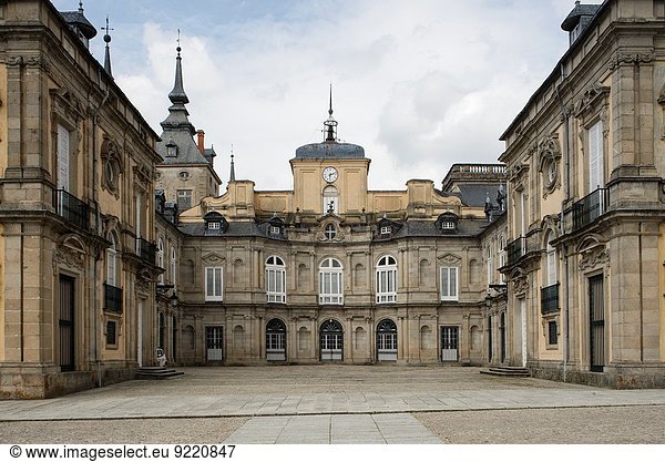 The Royal Palace of La Granja de San Ildefonso is an 18th-century palace in the small town of San Ildefonso in the hills near Segovia formerly the summer residence of the Kings of Spain since the reign of Philip V. The palace is in a restrained baroque style surrounded by extensive gardens in the French manner and sculptural fountains.