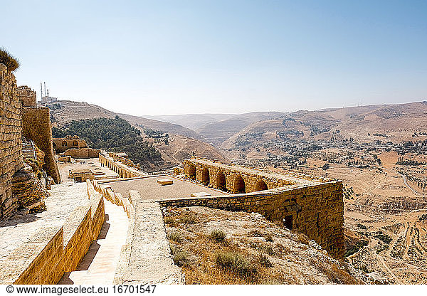 The ruins of Kerak Castle overlooking countryside in Jordan