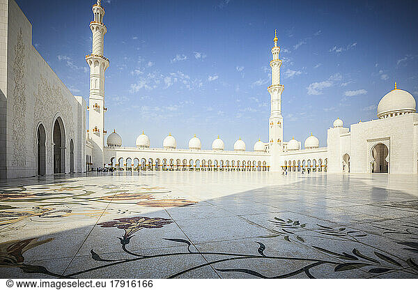 The Sheikh Zayed Mosque  the courtyard and exterior of the prayer hall  modern architecture.