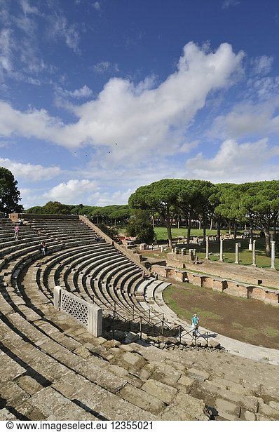 The Theatre and  in the background  the Market square of Ostia Antica. At the mouth of the River Tiber  Ostia was Rome's seaport two thousand years ago. Italy.