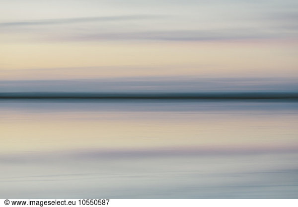 The view across the flooded salt flats at dawn at Bonneville Salt Flats in Utah