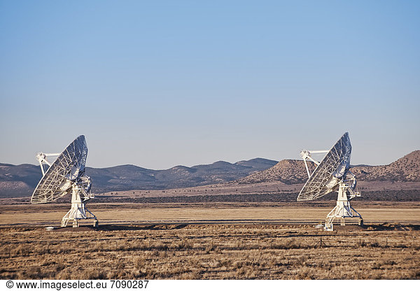 The VLA at Socorro is one of the world's premier astronomical radio observatories. Antennae in rows.