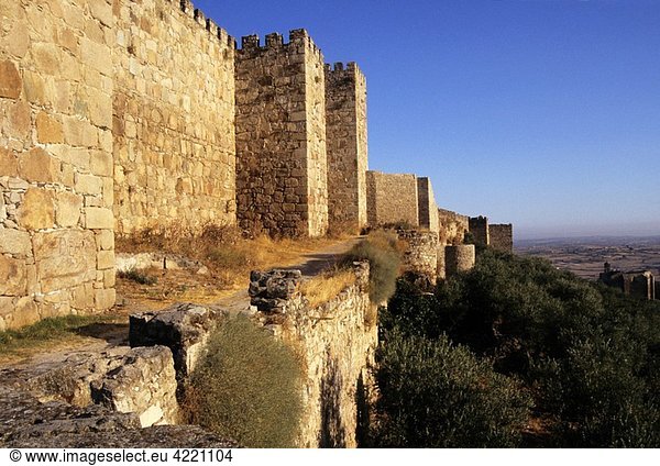 the walls of the castle at dusk Trujillo Cáceres province Spain