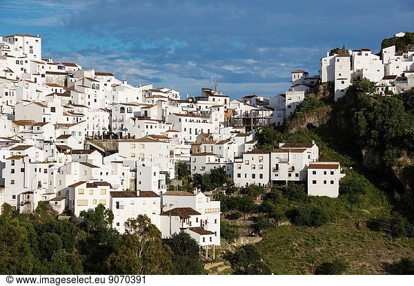 The White Town of Casares clings to a steep hillside. Málaga province  Andalusia  Spain.