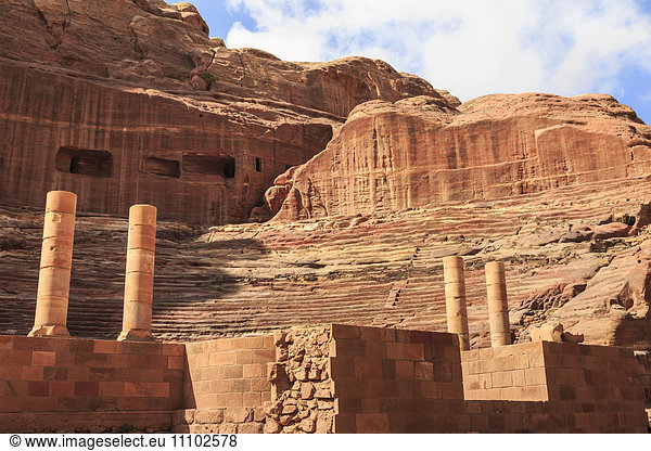 Theatre carved into the mountainside  with stage wall and columns  Petra  UNESCO World Heritage Site  Jordan  Middle East