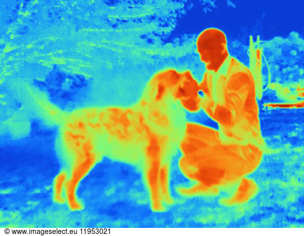 Thermal image of man with dog