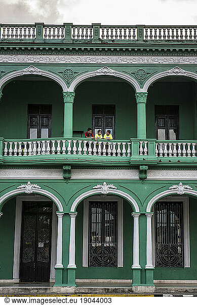 Three Boys Laughing on an Arched Balcony in Santa Clara  Villa Clara  Cuba