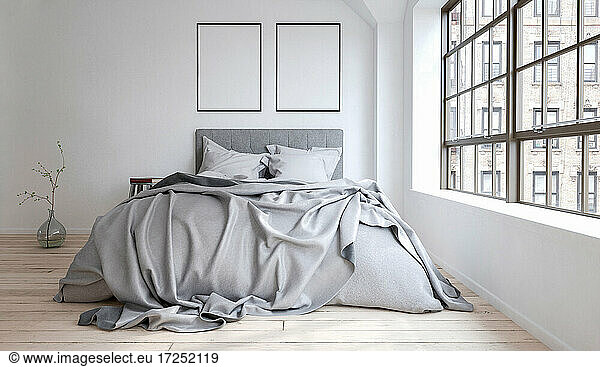 Three dimensional render of bedroom with gray bedding and blank picture frames