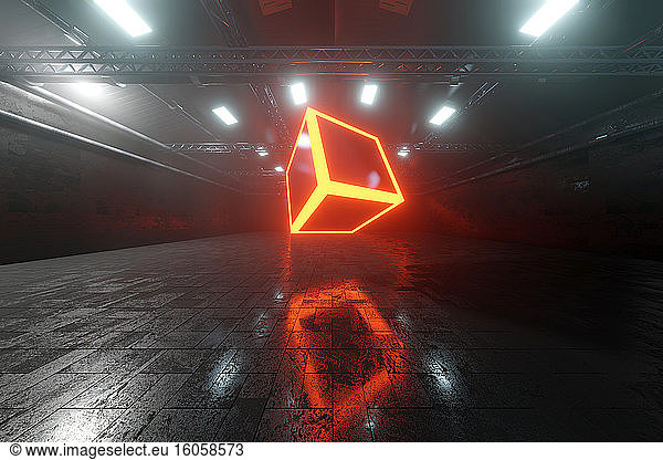 Three dimensional render of glowing cube inside dark warehouse