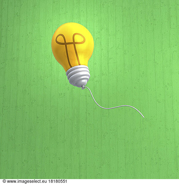 Three dimensional render of light bulb floating against green background