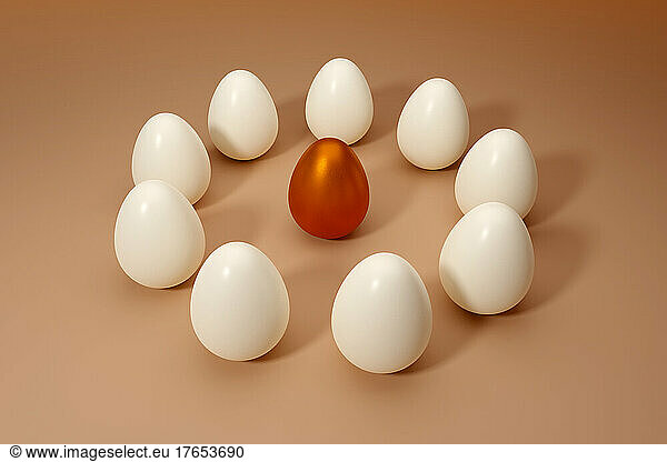 Three dimensional render of orange metallic egg surrounded by white ones