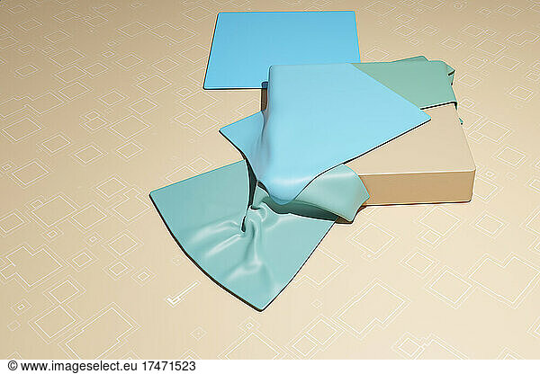 Three dimensional render of pastel blue fabric swatches against beige background